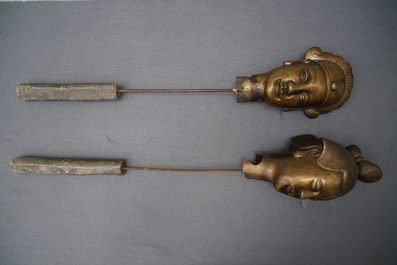 A pair of large Chinese bronze nodding-head figures for the Vietnamese market, 19th C.